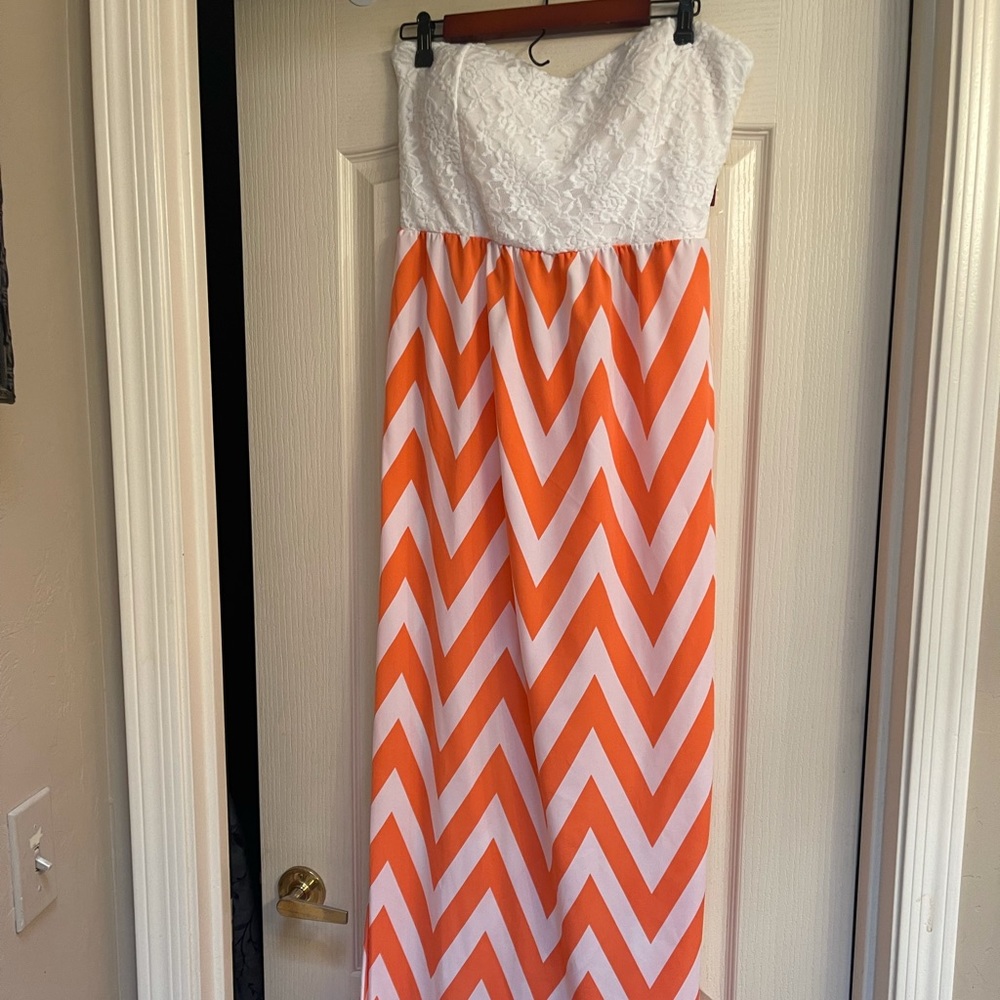 Never worn coral and white chevron maxi dress.